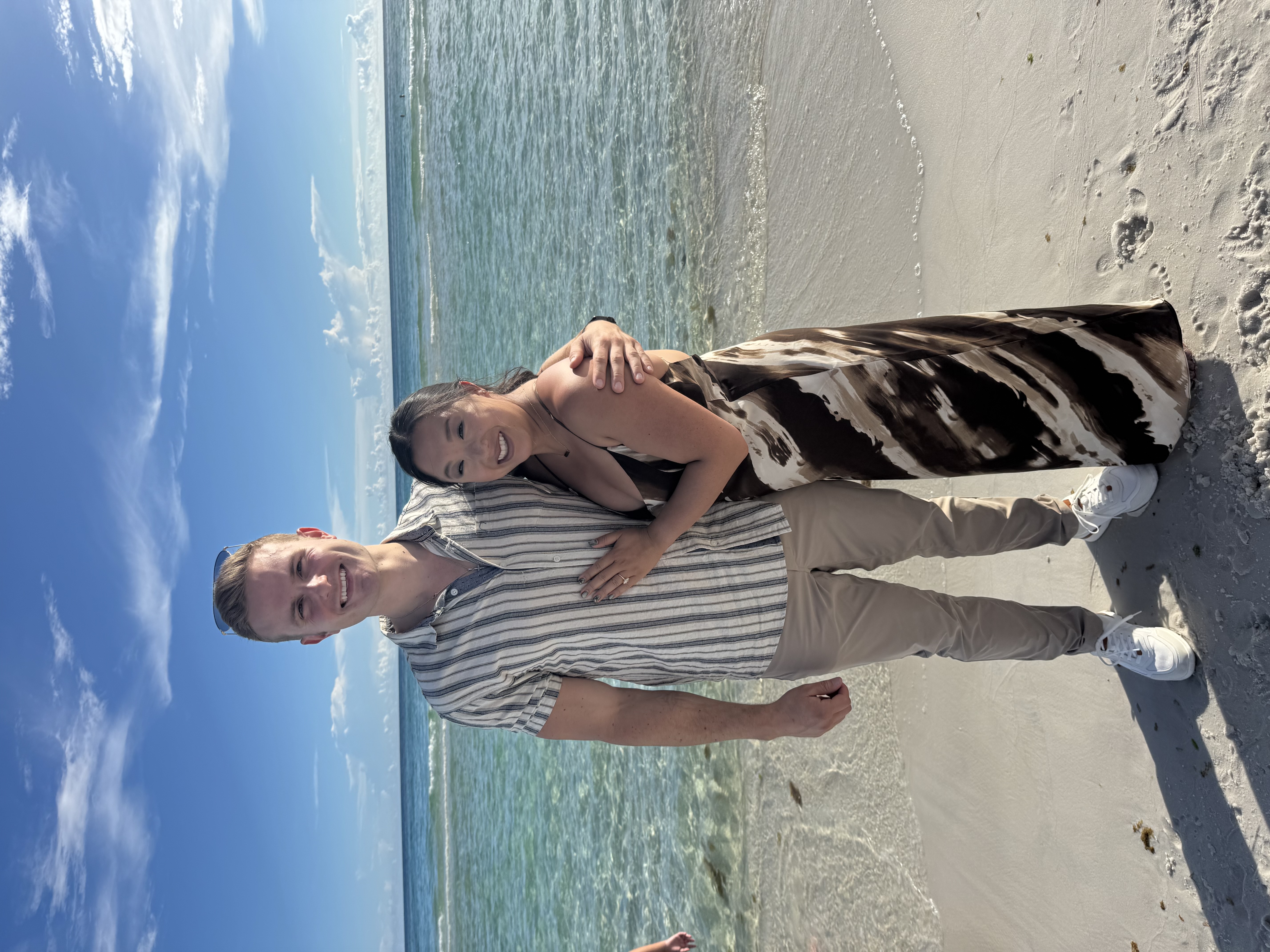 Kevin Brusca with his fiancée on the beach